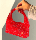 The Crimson Milano bag is made with beadwork.