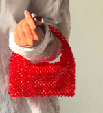 The Crimson Milano bag is made with beadwork.