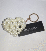 The pearl heart keychain which is totally handmade with pearl beads.